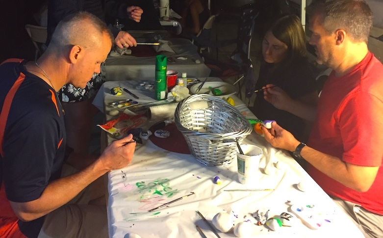 <p>One of several rock painting parties held this summer to help grow the overseas rock garden.</p>
