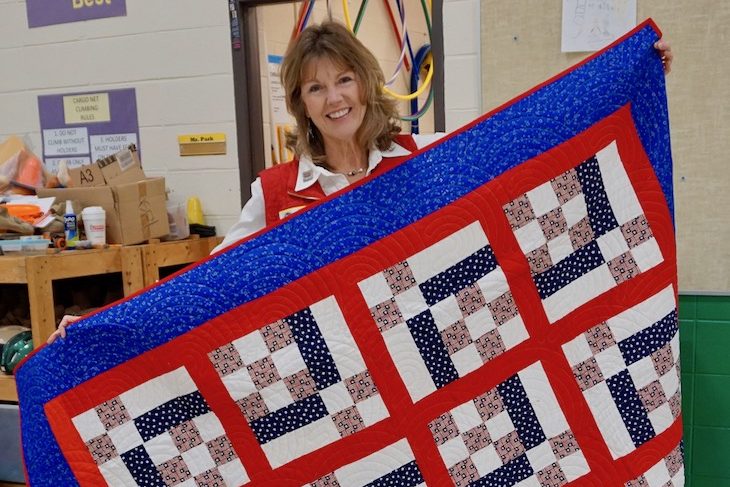 <p>Mrs. Peck is part of the “Land of Lincoln Quilts of Valor” quilting group. It’s one of several groups around the country that make quilts for military service members and veterans.</p>
