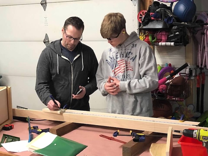 <p>Jon Green, husband of AGS first-grade teacher Kristin Green, lent a helping hand, his tools, and wood shop to Austin.</p>
