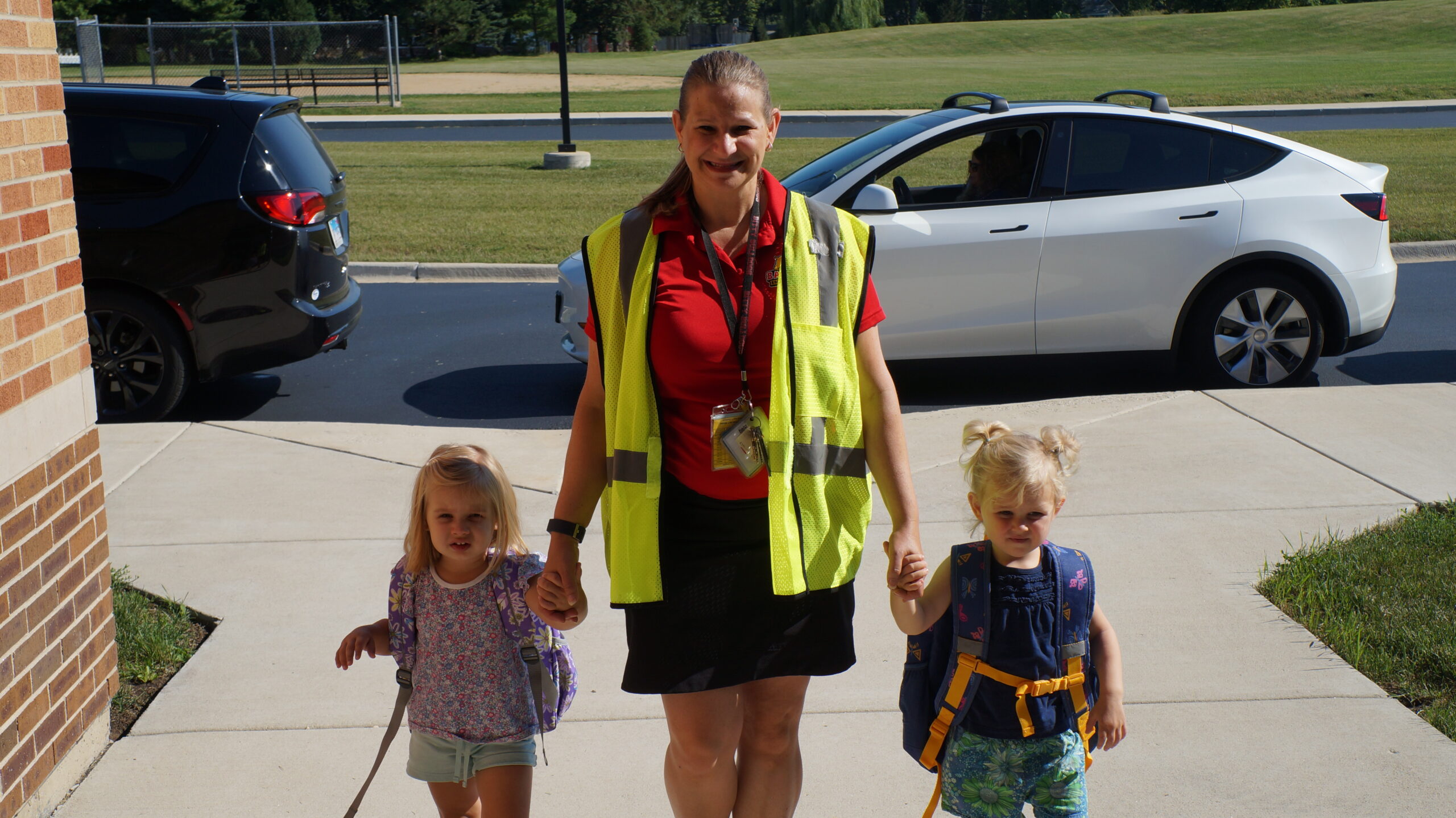 <p>Paulette Ollie, Early Childhood Coordinator, with two ECC students.</p>

