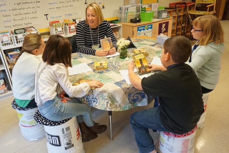 <p>AGS students getting a taste of the book, “Bridge to Terabithia.”</p>
