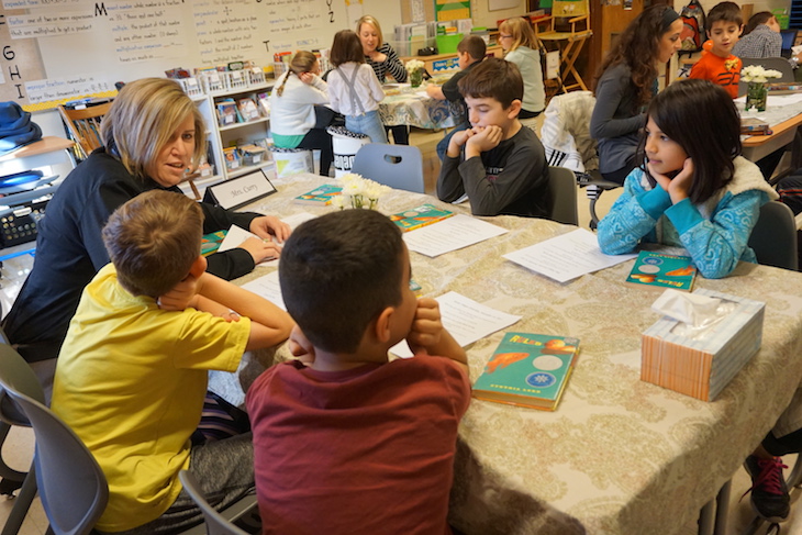 <p>AGS and LWS Assistant Principal Cheryl Curry sharing one of her most recent reads, “Rules” by Cynthia Lord.</p>
